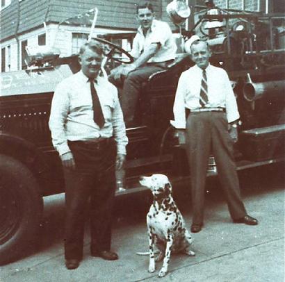 Belle was born in May 1942.  She is shown here in this 1947 photo sitting between Lt. Everett Doherty and Larry Spahr of Co. 3.  Bob O'Donnell is sitting in the driver's seat of Engine 3.