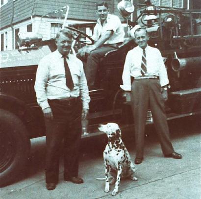 Belle was born in May 1942. She is shown here in this 1947 photo sitting between Lt. Everett Doherty and Larry Spahr of Co. 3. Bob O'Donnell is sitting in the driver's seat of Engine 3.
