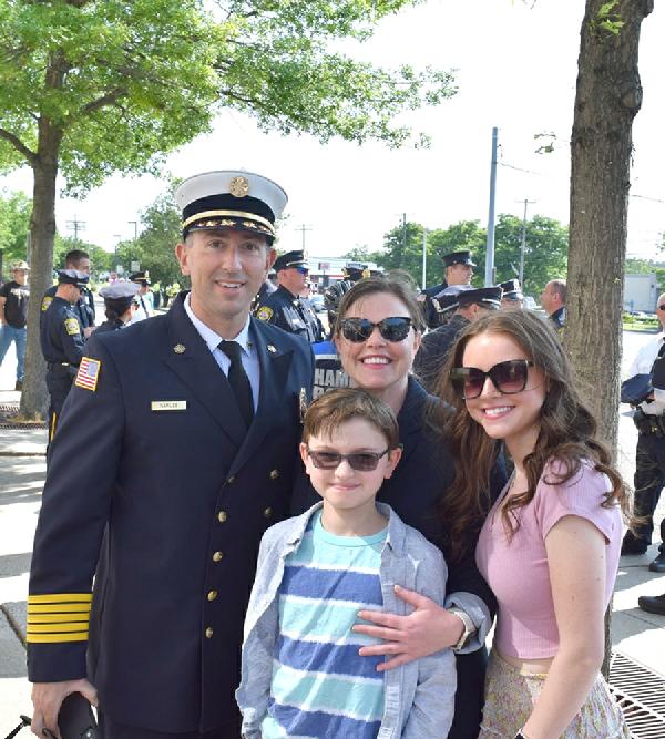 Chief Jeff Naples greeted Mayor Lauren Garrett and her children, Bobby and Abby, om what turned out to be a picture-perfect day.