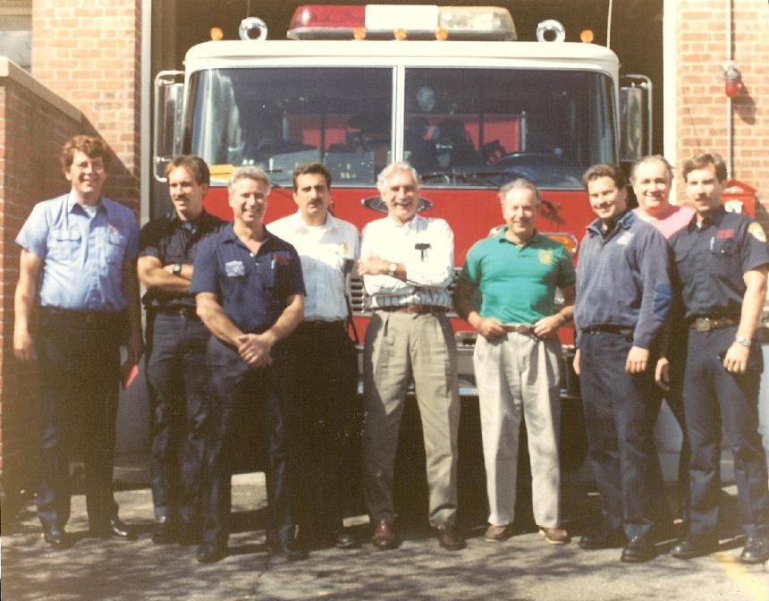 Joe McDermott commanded Platoon Two from May 1973 until his retirement at the end of September 1991. On the final day of Platoon Two's day shift in September 1991, Chief John Tramontano escorted Cmdr. McDermott to all fire station so his guys could wish him a happy, healthy and long retirement. Joe is now living in Branford and is still going strong. L-R: Capt. Dave Johnson, Ron Desroches, Bob Anthony, Cmdr. Bill Coppola, Cmdr. McDermott, Chief John Tramontano, Bill Fitzmaurice, Ed Doiron, and Jim Dunlop. (Photo taken by Bob Macauley)